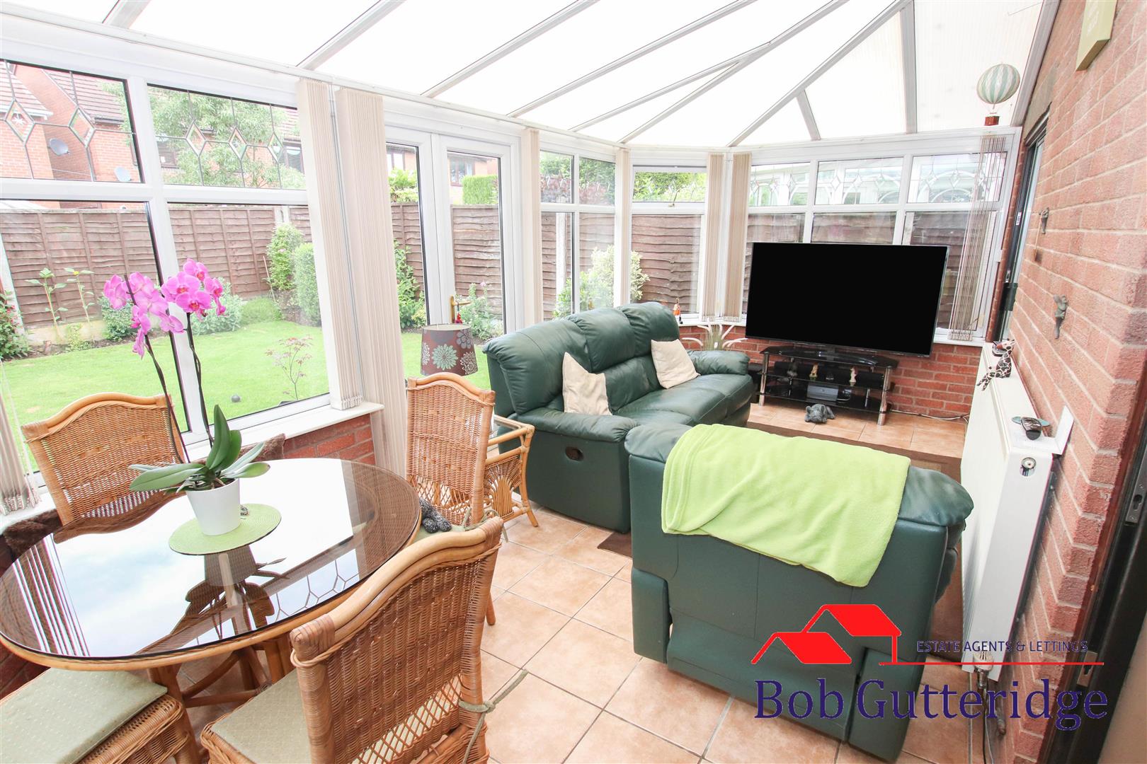 HALF BRICK & UPVC DOUBLE GLAZED CONSERVATORY